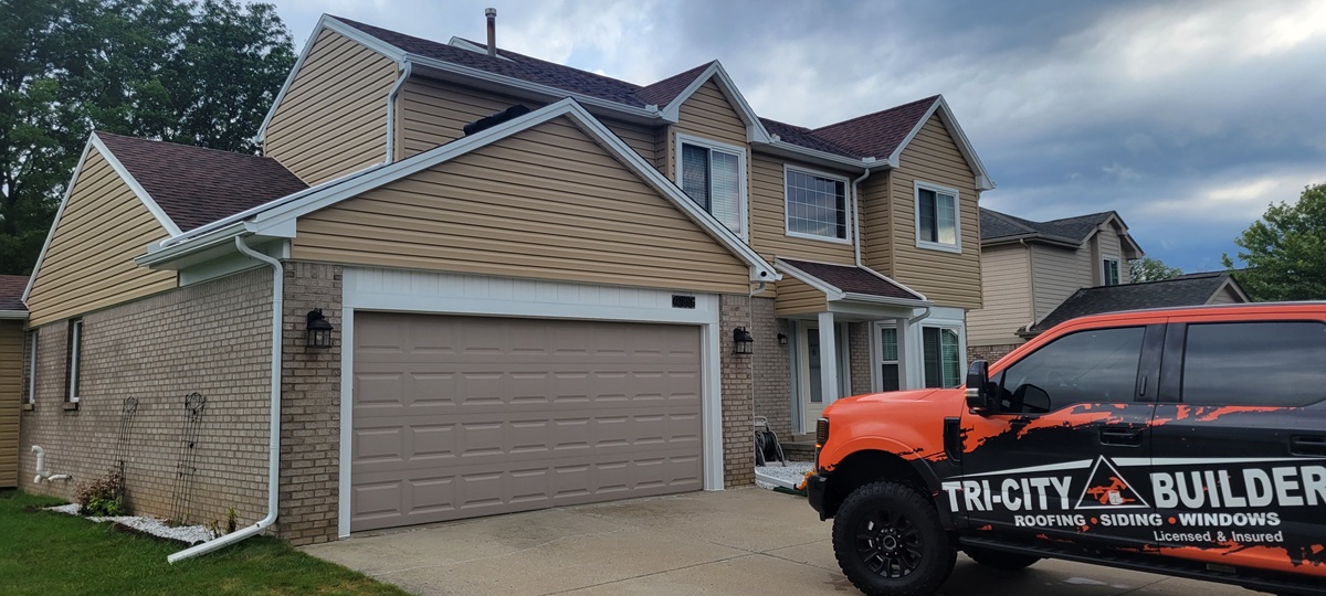 Finished siding home in Westland